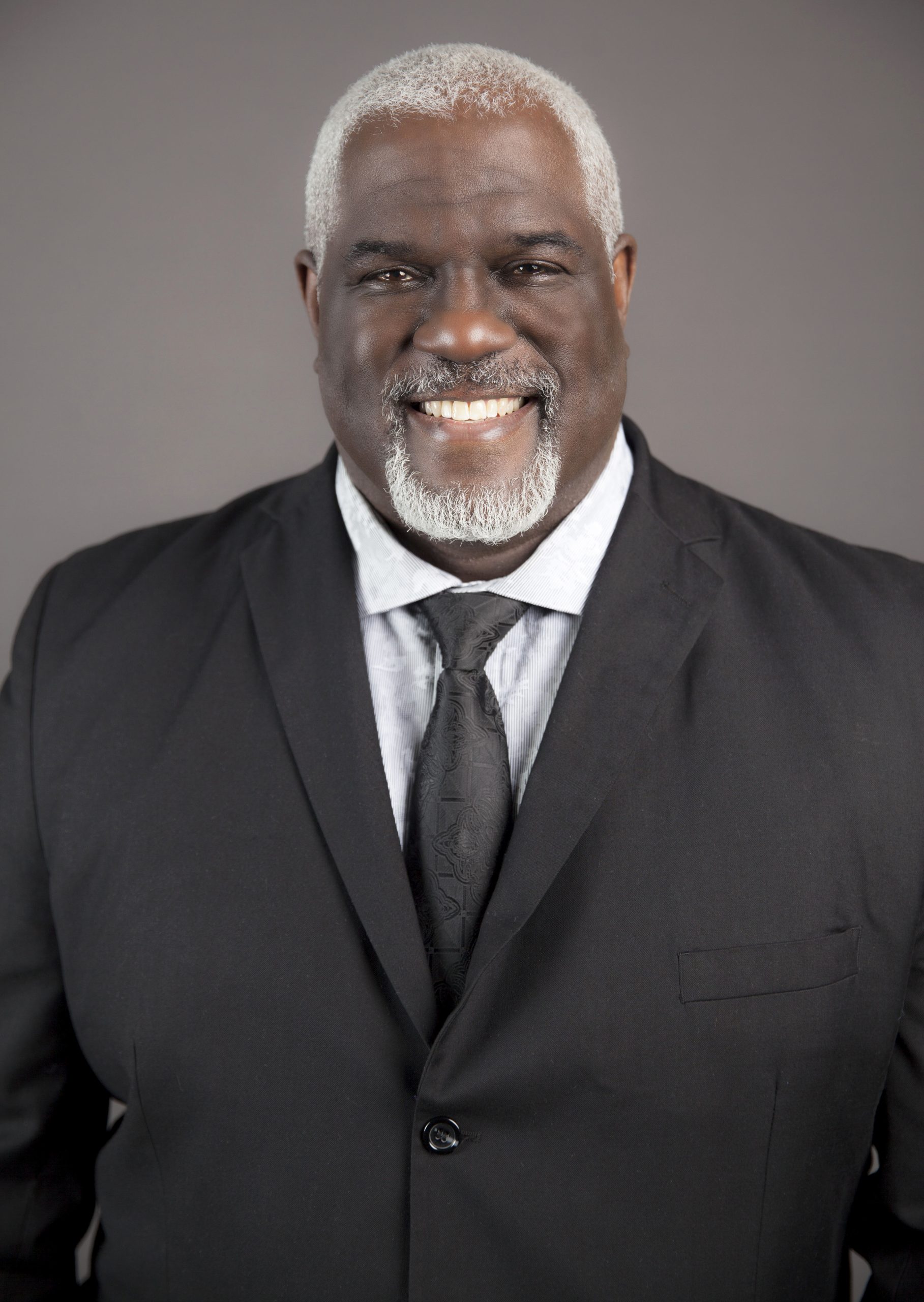 1742418249_melheadshot2-scaled